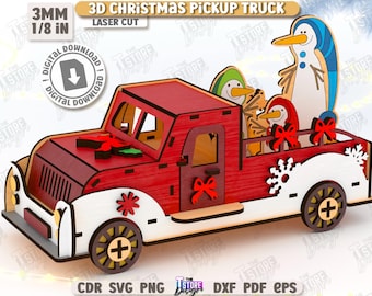 May include: A laser-cut 3D Christmas pickup truck with a red cab and white bed, decorated with snowflakes and bows. The truck bed features penguin figures. The text "3D CHRISTMAS PICKUP TRUCK" is visible.