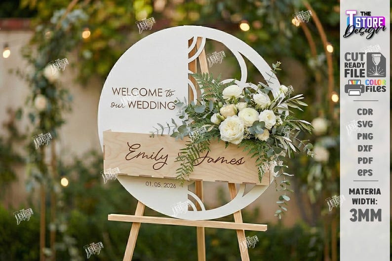 May include: A white wooden wedding sign with the text "WELCOME to our WEDDING" and the names "Emily & James" with the date 01.05.2026. The sign is decorated with white flowers and greenery and is displayed on a wooden easel.