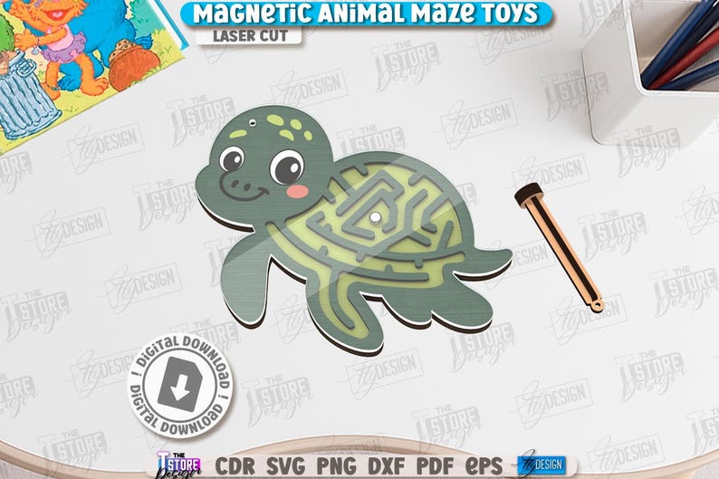 May include: A laser-cut wooden turtle-shaped maze toy with a magnetic wand. The turtle is green with a light green maze design. The text "MAGNETIC ANIMAL MAZE TOYS" is at the top. A digital download icon is also present.