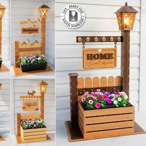 May include: Laser-cut wooden garden decor featuring a lamppost, welcome sign, and flower box. The sign reads "HOME Sweet Home". The design includes a cat silhouette and a fox silhouette. The material width is 6mm.