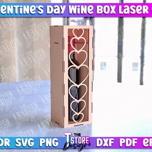 May include: A laser cut wooden wine box with a heart design. The box is 3 mm thick and is designed to hold a standard size wine bottle. The box is perfect for a Valentine's Day gift.