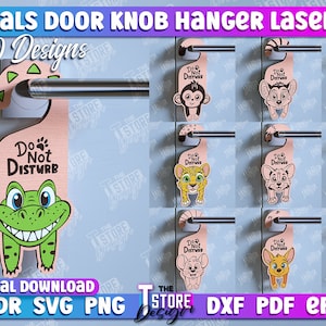 May include: Ten designs of laser cut door knob hangers featuring various animals with the text "Do Not Disturb". The hangers are pink with a white paw print and the animals are in various colors. The designs include a monkey, a raccoon, a lion, a fox, a crocodile, and a cat.