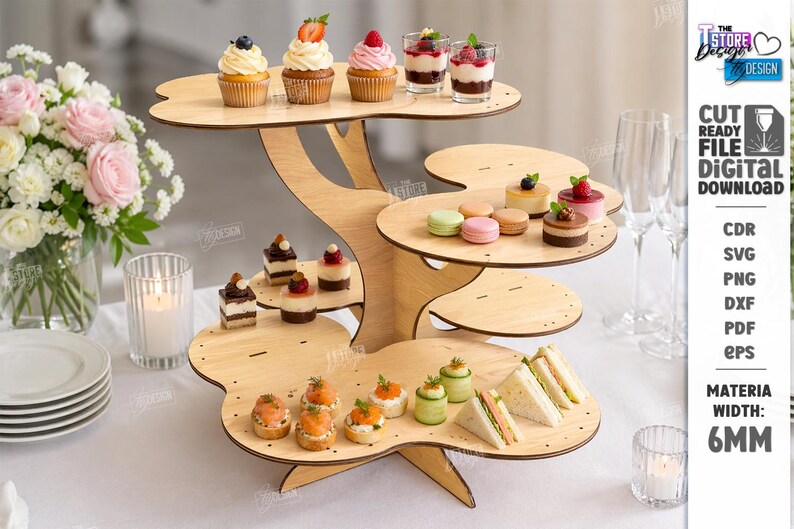 May include: A multi-tiered wooden serving stand, shaped like a tree, displaying various appetizers and desserts. The stand holds cupcakes, mini desserts, macarons, and sandwiches. The text "CUT READY FILE DIGITAL DOWNLOAD" is visible on the right.