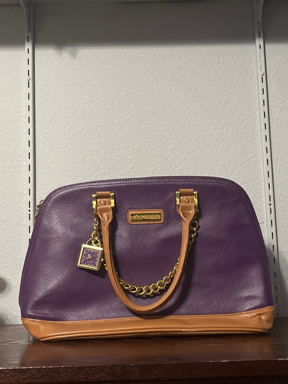 joy & iman purses