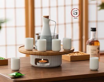 Sake heater set with its porcelain cups and handmade with minimalist style