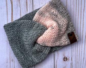 May include: A gray and pink knitted headband with a brown leather tag that says "Kennedy & Co."