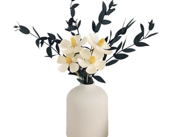 Home decor, paper flowers set up in vase .