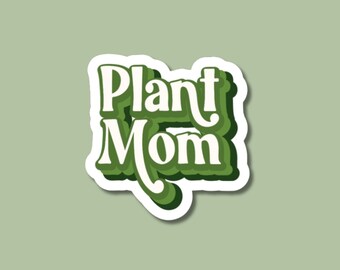May include: Green and white sticker with the text "Plant Mom" in a stylized font.