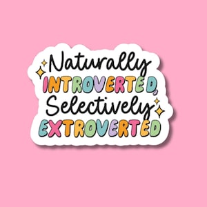 May include: A sticker with the text "Naturally Introverted, Selectively Extroverted" in colorful, outlined letters. The sticker has a white background and a white border.