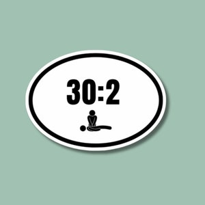 May include: White oval sticker with black text and a black stick figure illustration. The text reads "30:2".