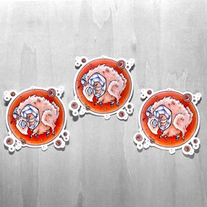 May include: Three round stickers with a white border and a red background. Each sticker features a cartoon illustration of a white sheep with blue horns and a blue face wearing a pair of glasses. The sheep are curled up in a ball on the red background.