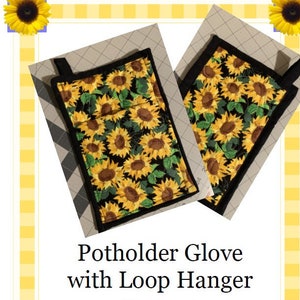 May include: Two black pot holders with a sunflower print and a loop hanger. The pot holders are made of fabric and have a black border. The text "Potholder Glove with Loop Hanger Pattern" is written below the pot holders.