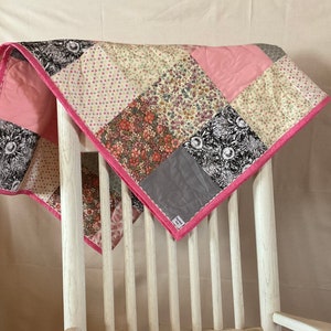 Handmade quilted baby blanket pink patchwork squares