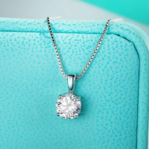 1 Carat Moissanite Solitaire Necklace: Sterling Silver, Round Cut