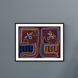 May include: A framed artwork with a colorful geometric design in shades of red, blue, yellow, and black. The artwork is set against a gray wall.