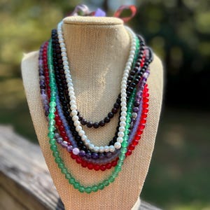 Glass and gemstone necklaces