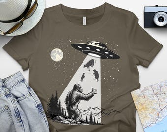 Bigfoot UFO Abduction T-Shirt, Moonlight Alien Cow Abduction Shirt, Sasquatch UFO Graphic Tee Funny Cryptid T-shirt, Bigfoot UFO Hitchhiking
