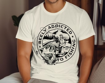 Reely Addicted To Fishing T-Shirt, Funny Fishing T-Shirt for Anglers, Fishing Gift Tee, Unique Graphic Tee for Fishermen and Women