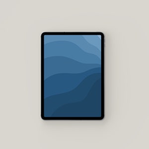 May include: A tablet computer with a blue abstract background. The background features a series of overlapping waves in shades of blue.