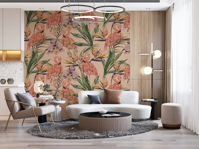 May include: A living room interior design with a white sofa, a round coffee table, a gray rug, and a wall with a tropical wallpaper featuring pink flamingos and green leaves.
