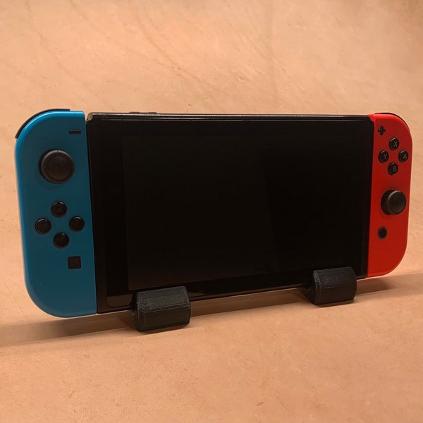 Enhanced Gaming Experience: Nintendo Switch Stand Holder for Comfortable Play and Convenient Display