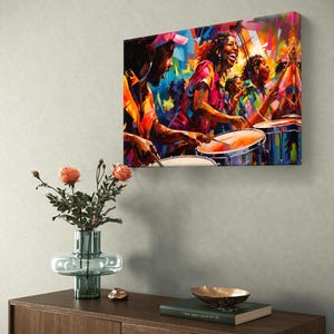 May include: A vibrant, abstract painting on canvas depicts a band playing music. The artwork features musicians playing drums and guitars, with bright colors like orange, blue, and pink. The painting is mounted on a wall above a wooden cabinet.