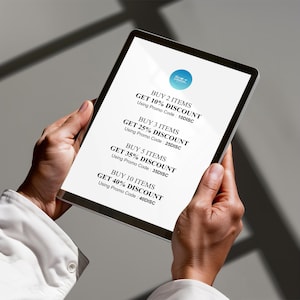 May include: A tablet screen displaying a discount offer for buying multiple items. The offer states "Buy 2 items, get 10% discount, using promo code: 10DISC".  The offer continues with increasing discounts for buying 3, 5, and 10 items.