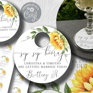 Puede incluir: Etiquetas redondas blancas para bebidas con un diseño de girasol y el texto "sip sip hooray Christina & Timothy are getting married today" con el nombre "Brittany H." impreso debajo.