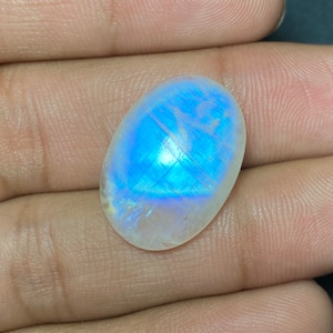 Ultimate !!! Full Blue Flashy Rainbow Moonstone Oval Shape Cabochon - 16.50x23x6 MM. Hand Polish Loose Gemstone With Black Tourmaline.!!