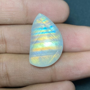A One Clean Designer Flash White Rainbow Moonstone Cabochon Hand Made Loose Gemstone Size- 16.50x27x8.50 MM. Fancy Shape For Making Jewelry.
