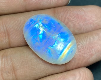 Éblouissant !!! Cabochon de forme ovale en pierre de lune arc-en-ciel flashy bleu complet - 19x27,50x7 mm. Pierre précieuse en vrac polie à la main pour fabriquer tous les bijoux.!!