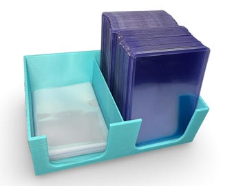 Porta-cartões Top Loader e porta-cartões Penny impressos em 3D na cor azul.
