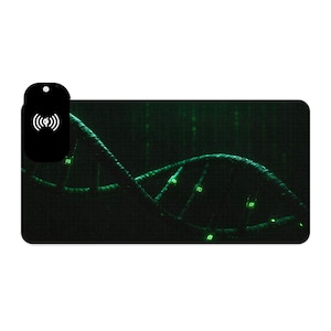 May include: Black rectangular mousepad featuring a glowing green DNA strand design. A black wireless charging symbol is in the upper left corner. The background has a dark green matrix-style pattern.