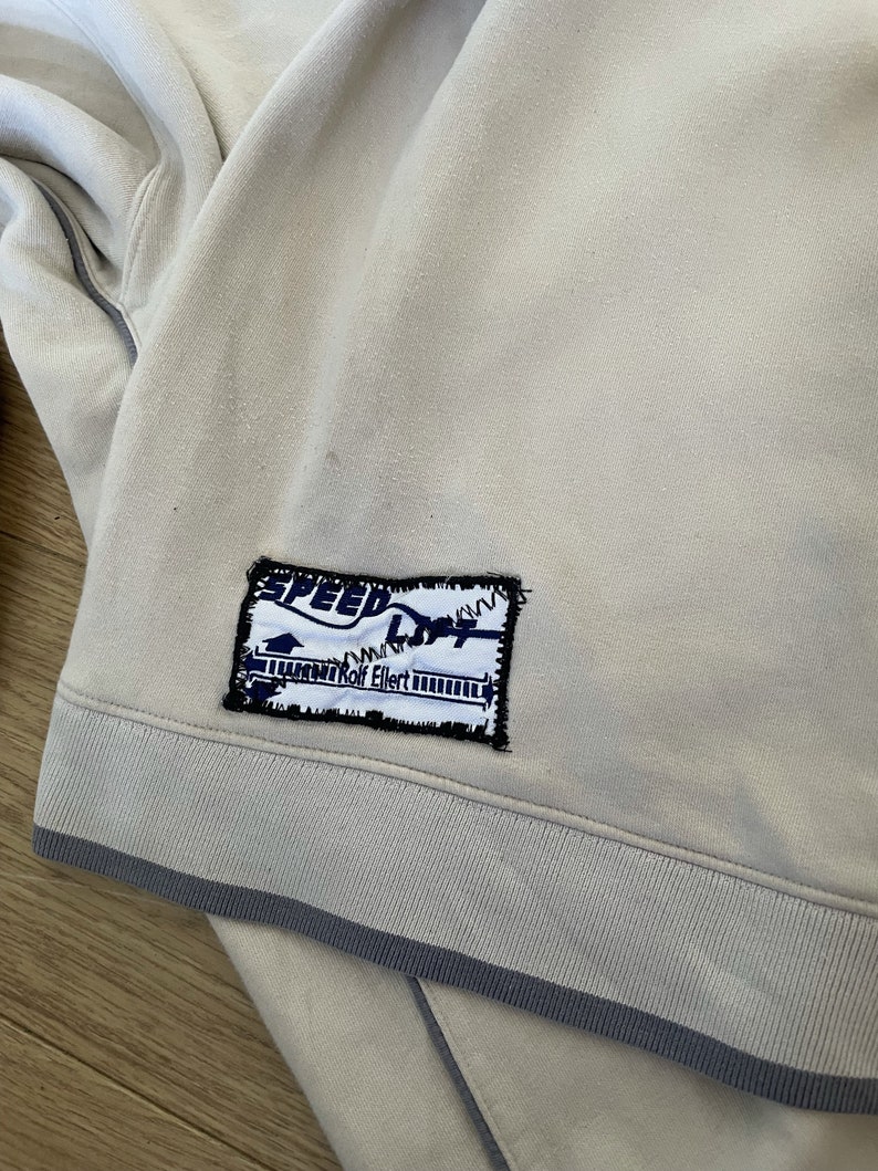 nike swoosh beige sweatshirt