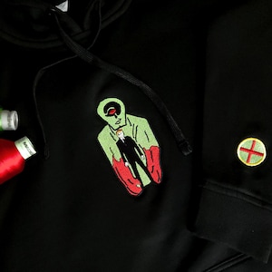Sweat à capuche brodé à motif graphique, sweat-shirt à col rond à personnage de BD
