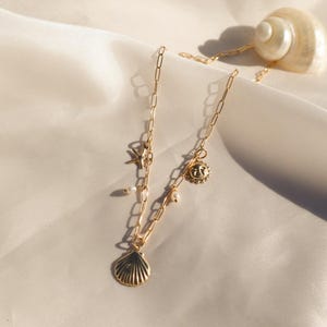 Gold Filled Charm Necklace with Sun, Shell, Starfish & Pearls,Ocean-Inspired Layering Necklace, Dainty Beach Jewelry, 14k Gold Filled