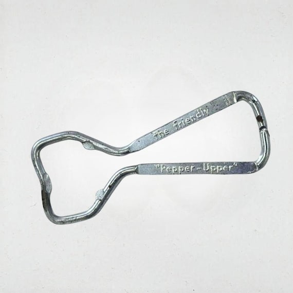 Vintage Dr. Pepper bottle opener "The Friendly Pepper-Upper"
