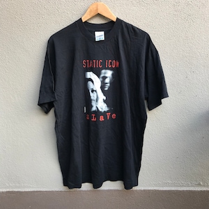 May include: Black t-shirt with a white and gray image of a band called "Static-X" and the word "Slave" in red letters.
