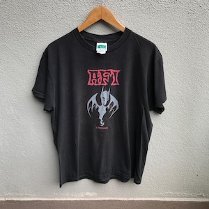May include: Black t-shirt with a red and white graphic of a bat with the text "AFI" and "I Remain" printed on the front.