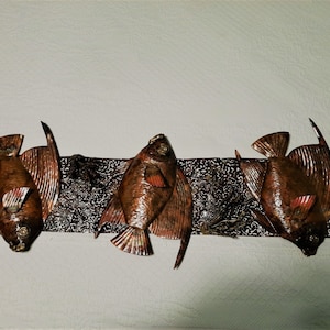three fish hand crafted copper wall hanging