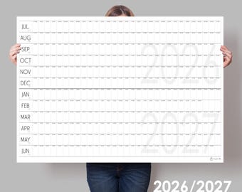 May include: A large horizontal wall calendar for the years 2026 and 2027, featuring a white grid layout with months listed from July to June on the left side. The calendar includes thin black lines for daily tracking and large, faint gray text indicating the years 2026 and 2027 across the center.