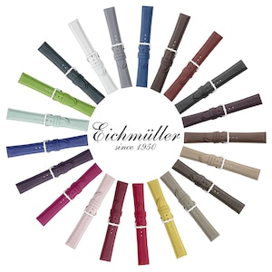 Könnte beinhalten: Eine Ansammlung farbenfroher Uhrenarmbänder, kreisförmig angeordnet. Die Armbänder sind in verschiedenen Farben erhältlich, darunter Grün, Blau, Rot und Braun. Jedes Armband hat eine silberne Schnalle. Der Text "Eichmüller since 1950" ist enthalten.