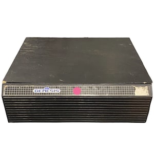 May include: A black Sega Genesis game console storage case with a silver label that reads "SEGA GENESIS".