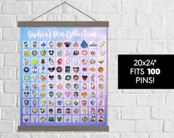 May include: A white canvas with a purple and pink ombre background and a gray wood frame. The canvas has a grid pattern with 100 squares. The text "Sophia's Pin Collection" is at the top of the canvas. The canvas is 20 inches by 24 inches and fits 100 pins.