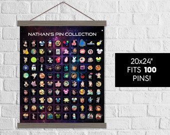 May include: A black canvas with a galaxy print, framed with a wood border and hanging on a white brick wall. The canvas has the text "NATHAN'S PIN COLLECTION" at the top and is filled with 100 small colorful pins. The text "20x24" FITS 100 PINS!" is in white text on a black background.