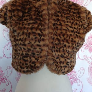 Glamorous Bette Davis-style short faux fur jacket