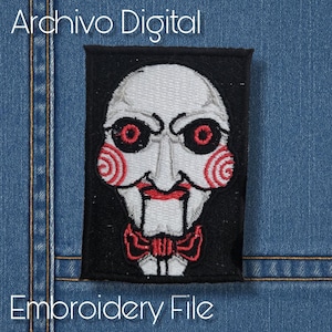 May include: Embroidered patch with a stylized face, red spiral cheeks, red eyes, and a red bow tie on a black background. The text "Archivo Digital" and "Embroidery File" are visible.