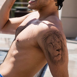 Tatuajes de leones y relojes store