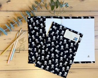 Environmentally friendly school book cover - black with white skulls design
