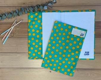 Environmentally friendly school book cover - teal smiley faces
